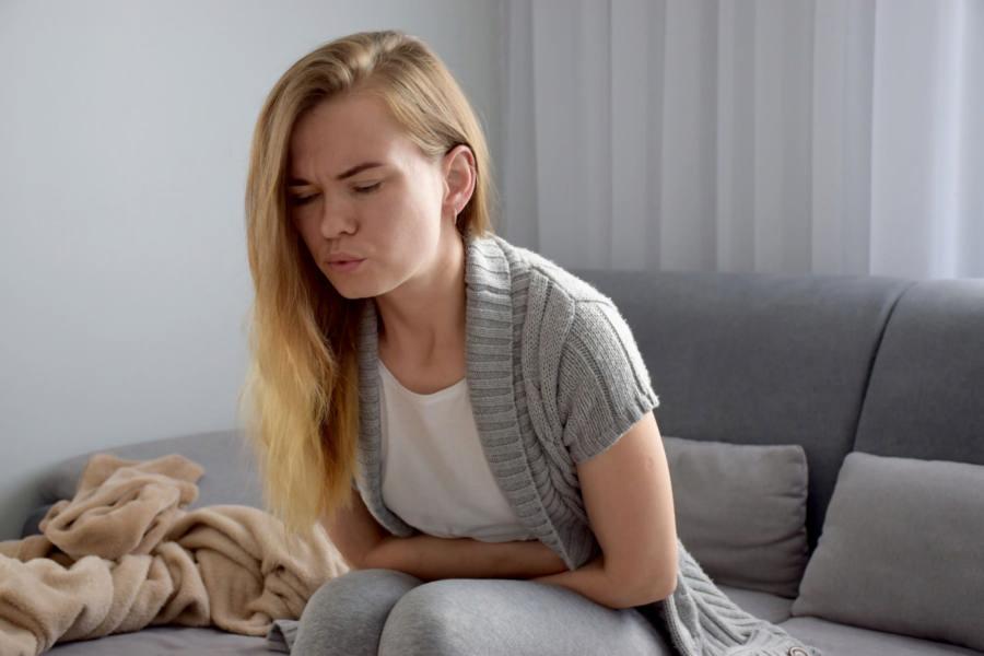 Тянущие боли внизу живота у женщин